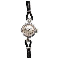 Rolex Ladies White Gold Diamond Manual Winding Wristwatch, circa 1950s