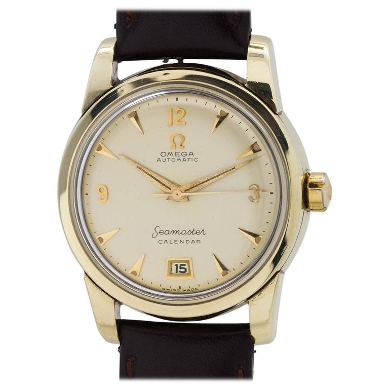 Omega Gold Seamaster Calendar Self Winding Wristwatch Model 27571, circa 1952 at 1stDibs