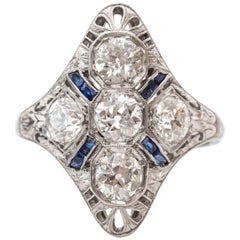 1920s Art Deco 1.50 Carat Ornate Old Mine Diamond and Sapphire Shield Ring