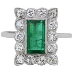 Late Art Deco Emerald and Diamond Cluster Ring, circa 1930s