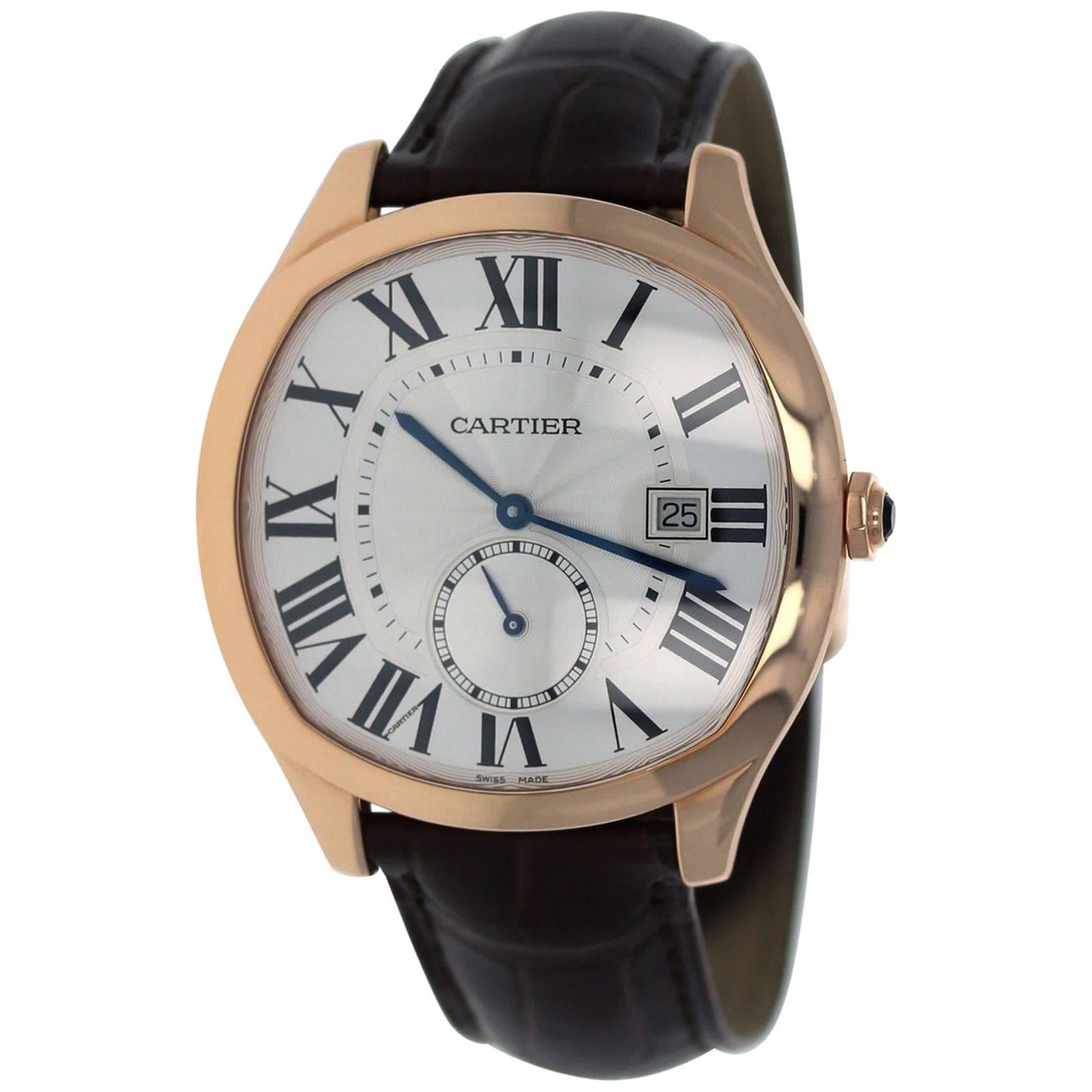 Brand Name:  Cartier 
Style Number:  WGNM0003 
Series:  Drive de Cartier 
Gender:  Men's 
Case Material:  18k Rose Gold  
Dial Color:  Silver w/ guilloche Finishings 
Movement:  Automatic 
Engine:  Cal. 1904-PS MC 
Functions:  Hours, Minutes,