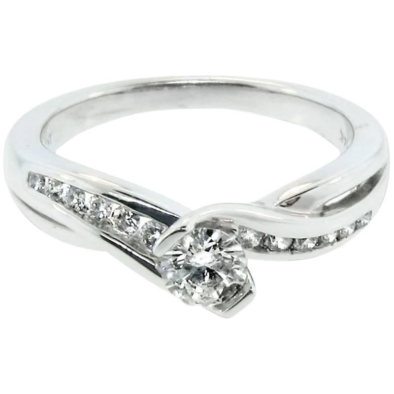 Sparkling White Diamond 14 Karat White Gold Engagement Ring Flowing Design For Sale