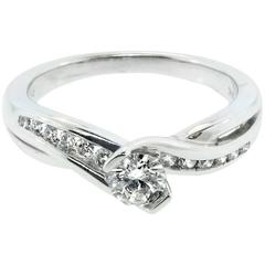 Sparkling White Diamond 14 Karat White Gold Engagement Ring Flowing Design