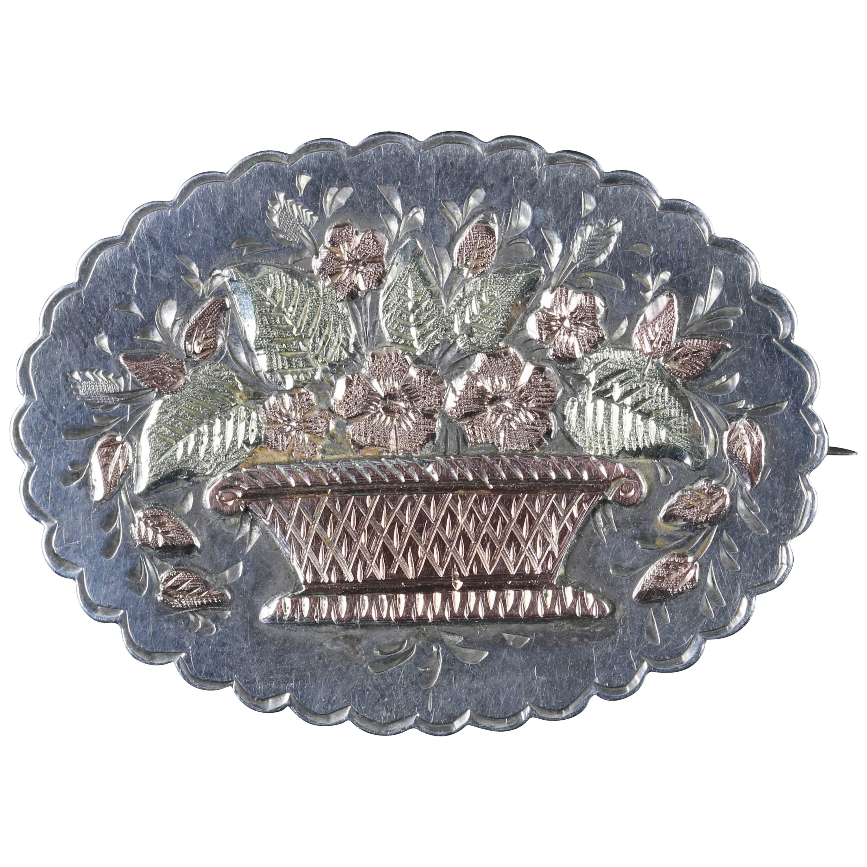 Antique Victorian Silver Gold, circa 1888 Basket Brooch For Sale