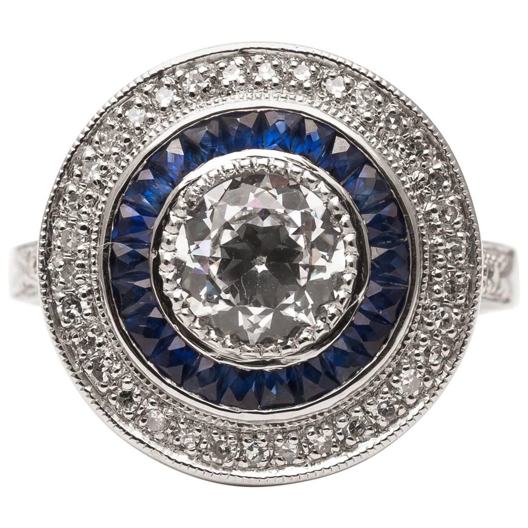 Striking Double Halo Diamond and Sapphire Target Ring in Platinum For Sale