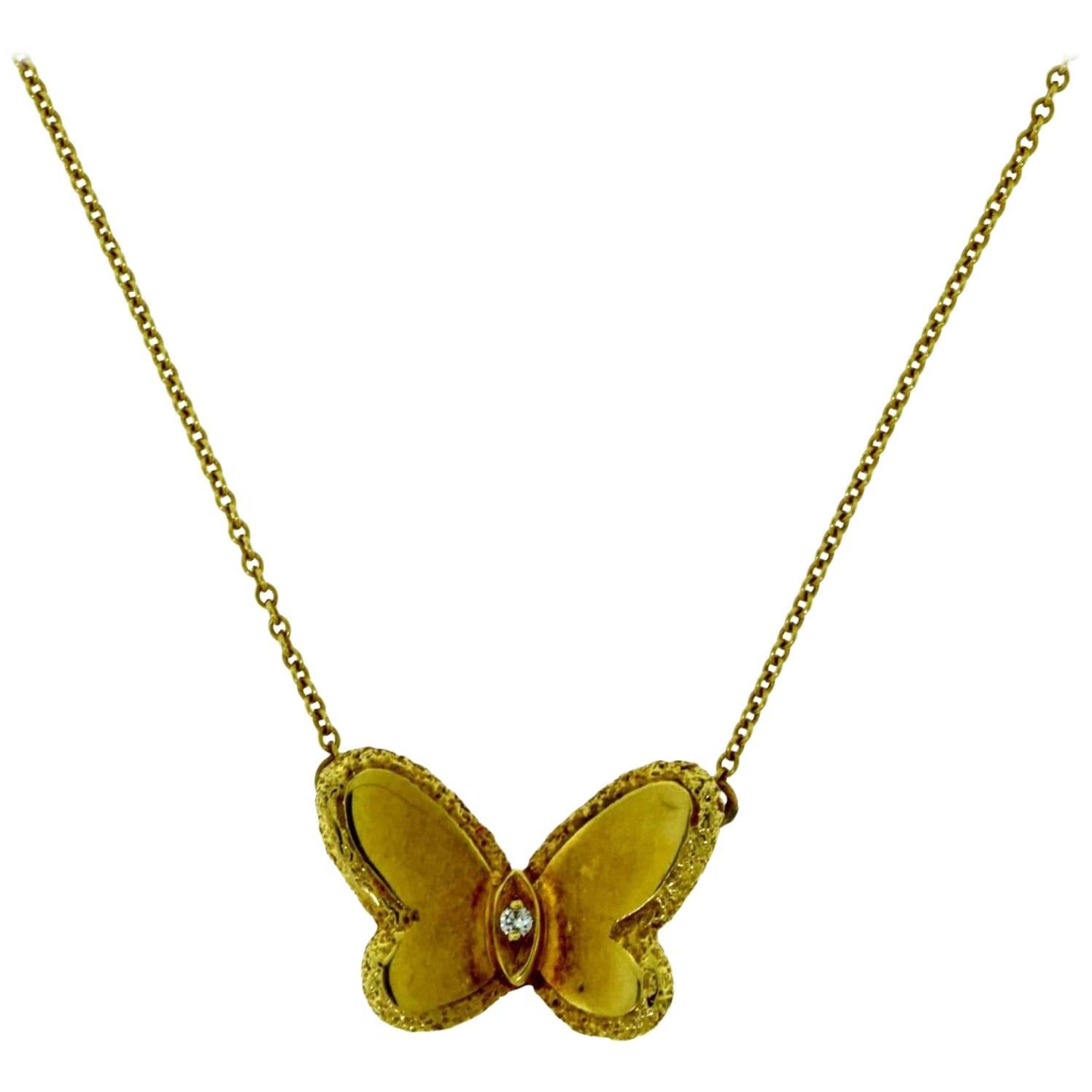 Van Cleef & Arpels Gold Butterfly Pendant Necklace with Diamond Center Stone For Sale