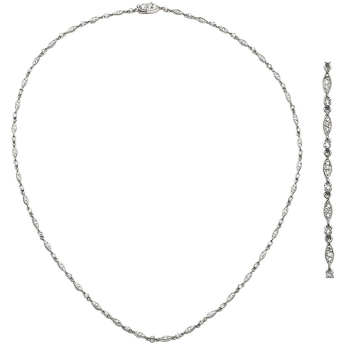 A modern diamond  necklace, with alternating navette shaped links and rub over settings, set with eight-cut and Edwardian-cut diamonds, mounted in platinum, estimated total diamond weight 0.70ct