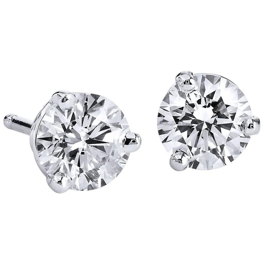 H & H 0.66 Carat Diamond Stud Earrings