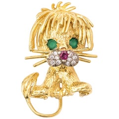 1950s French Lion Brooch 18 Karat Yellow Gold, Diamonds, Emeralds, Ruby