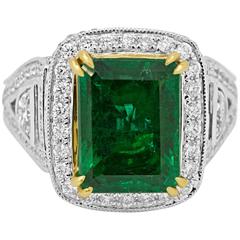 GIA Certified Emerald Diamond Two Color Gold Halo Ring 11