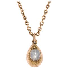 Rare Russian Textured Gold and Star Sapphire Egg Pendant, circa 1900