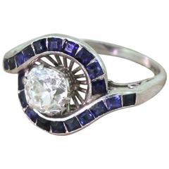 Mid-Century 1.43 Carat Old Cut Diamond and Calibré Cut Sapphire Ring