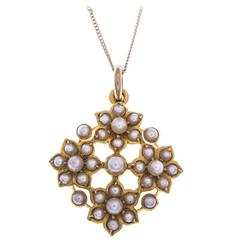 Edwardian Seed Pearl Gold Quatrefoil Daisy Pendant