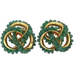 1980s Seaman Schepps Large Emerald Pretzel Knot Design Gold Clip-On Earrings