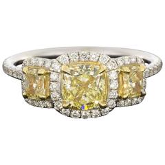 Fancy Yellow GIA Certified Cushion Diamond Halo Three-Stone Engagement Ring