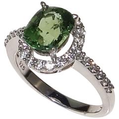 Glowing Oval Green Tourmaline Halo Set in Sterling Silver 8