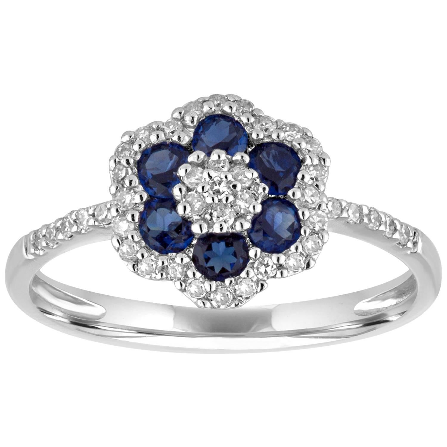 0.76 Carats Diamond and Blue Corundum Gold Flower Ring For Sale