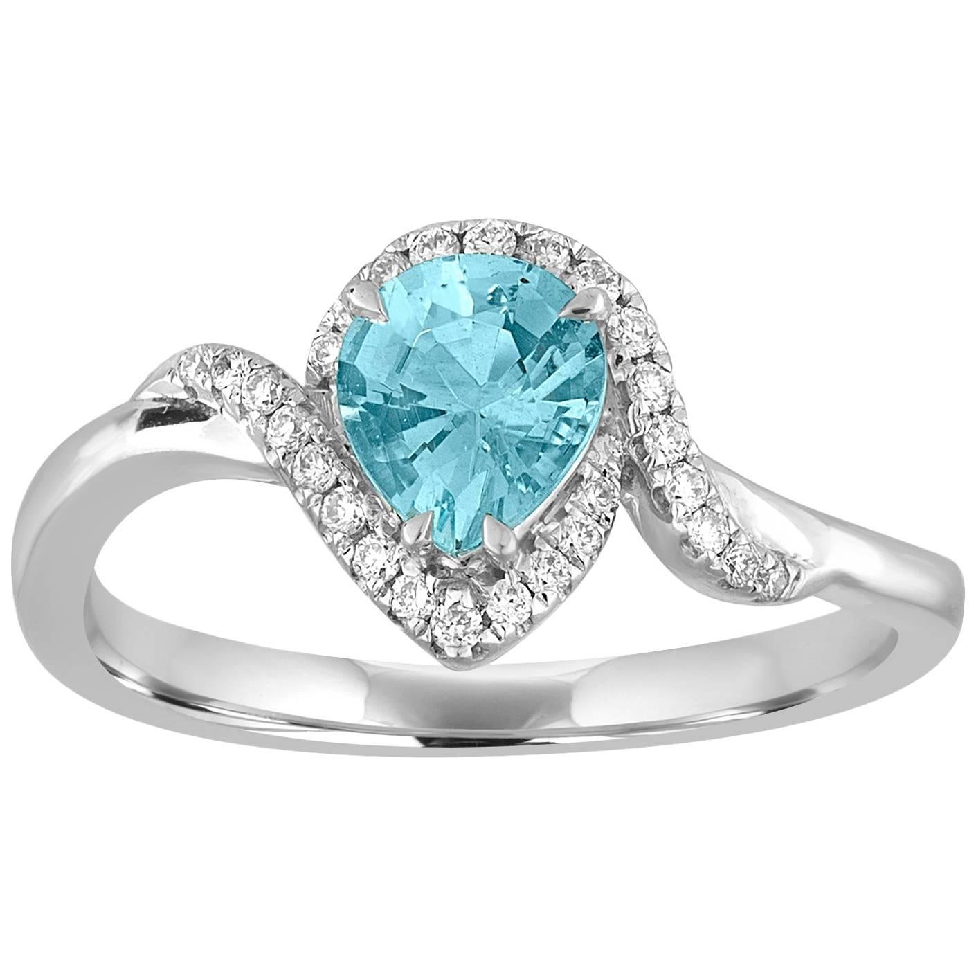 Pear Shape 0.62 Carats Blue Topaz and Diamond Twist Halo Gold Ring