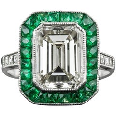 Retro 3.00 Carat Emerald-Cut Diamond Emerald Calibre Halo Ring