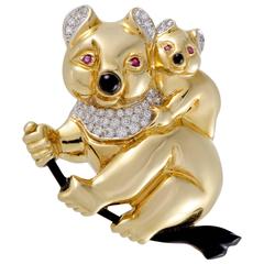 Vintage Cellini Diamond Ruby and Onyx Yellow Gold Koala Bears Brooch