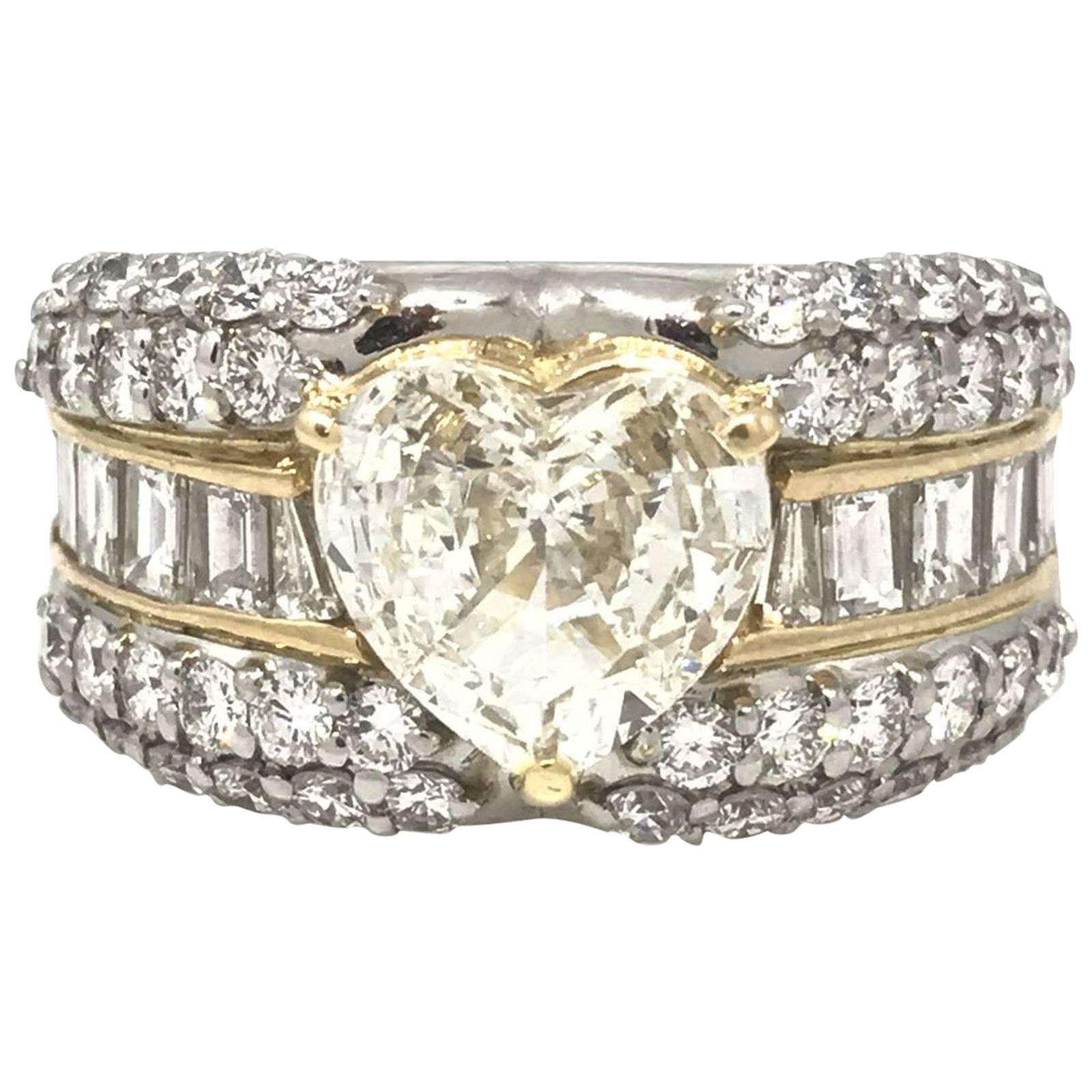 3.62 Carat Heart-Shape Diamond Platinum Ring with Rounds and Baguettes For Sale