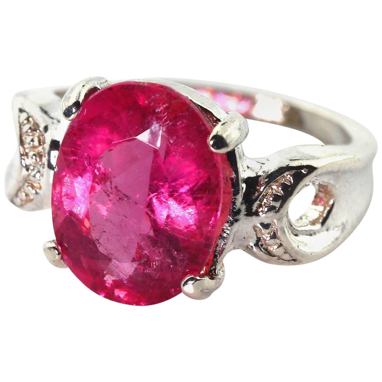 AJD Magnificent Oval 3.95 Ct Pink/Magenta Tourmaline Silver Cocktail Ring For Sale