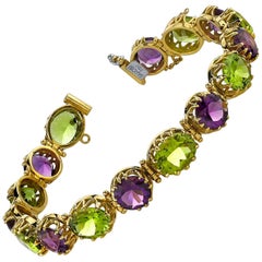 Used Peridot and Amethyst Tennis Bracelet in Yellow Gold, 33 Carats Total