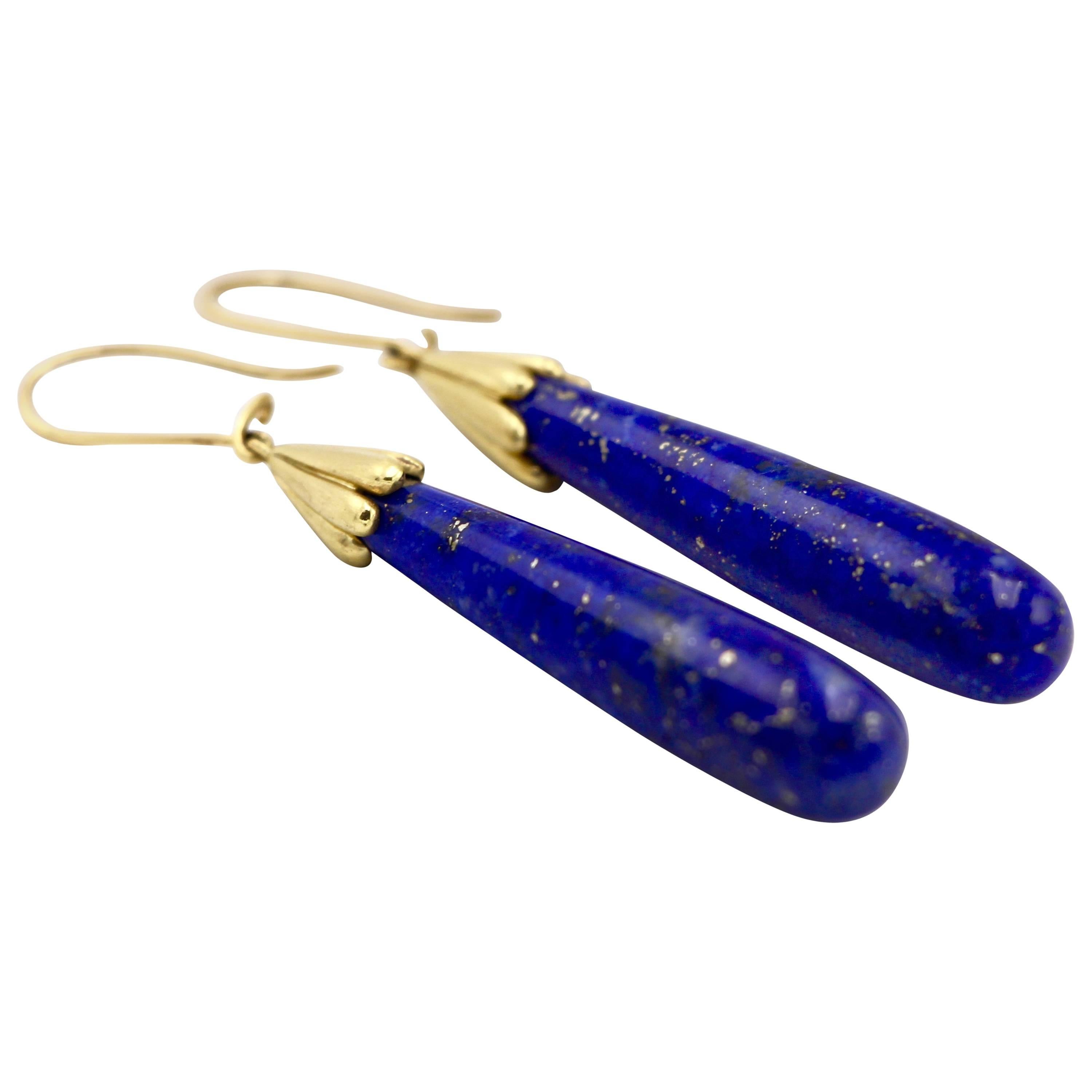 These stunning, deep blue Lapis Lazuli (95 Carat) petals, set in 18 Karat Gold, are a long sought-after and admired stone. Simply elegant.

