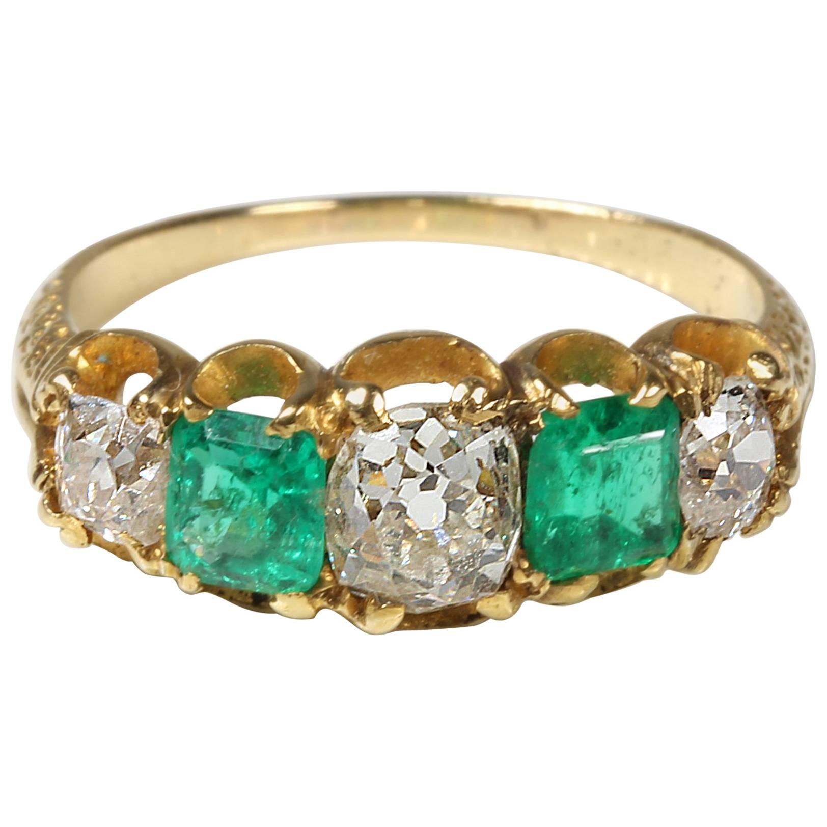 Circa 1890 18 Carat Gold Emerald Diamond Antique Victorian Engagement Ring For Sale