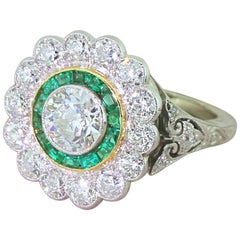 Art Deco 2.77 Carat Old Cut Diamond and Emerald Target Cluster Ring