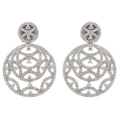 Boucles d'oreilles en or blanc 18 carats avec diamants ajourés