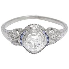 Art Deco Platinum .71 Carat Diamond Engagement Ring with Calibré Cut Sapphires