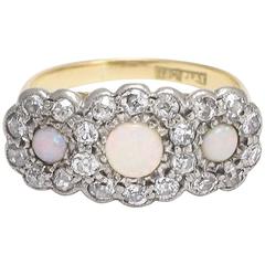 Early 20th Century Opal and Diamond Triple Daisy Ring