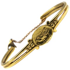 H. Woodhull 1990s Egyptian Revival Yellow Gold Bangle Bracelet