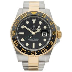 Rolex GMT-Master II Stainless Steel and 18 Karat Gold Gents 116713LN, 2012