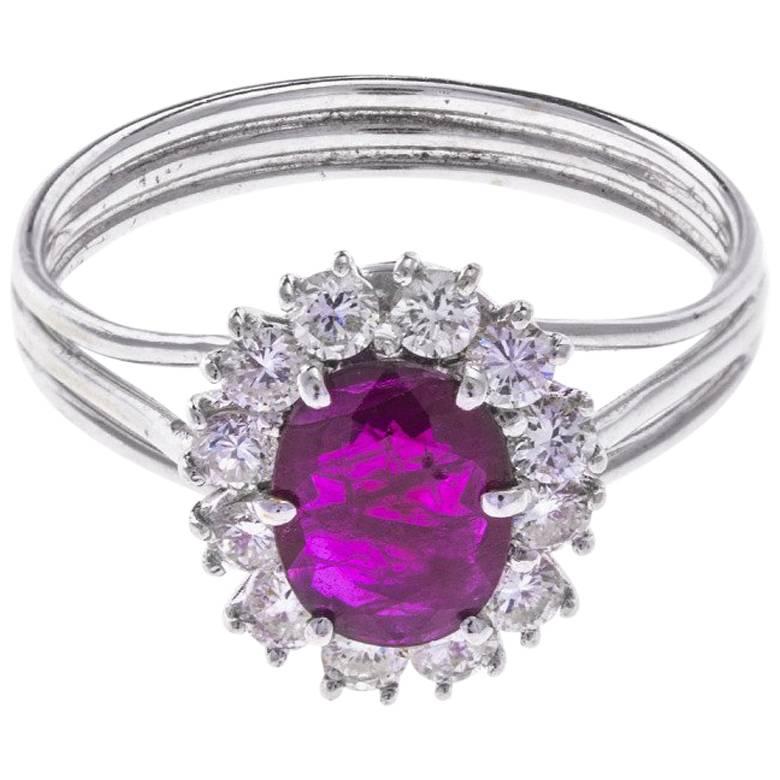 Vintage White Gold 0.75 Carat Ruby and 0.51 Carat Diamond Cluster Ring For Sale