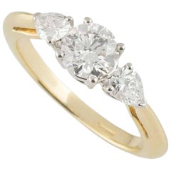Bague en or jaune à trois pierres et diamants de Tiffany & Co