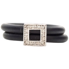 1990 Rubber and Diamond Buckle Ring Crafted in 14 Karat Gold