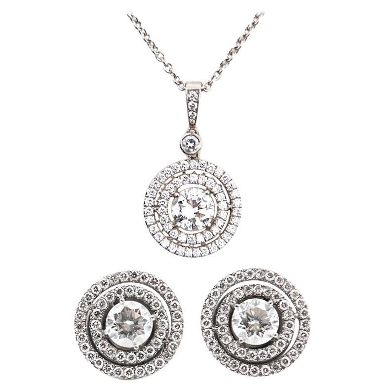 Pair of Diamond Earrings and Pendant Necklace