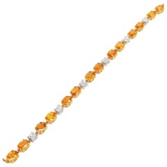 18K White gold invisible Oval Yellow Sapphire and Princess Diamond Bracelet