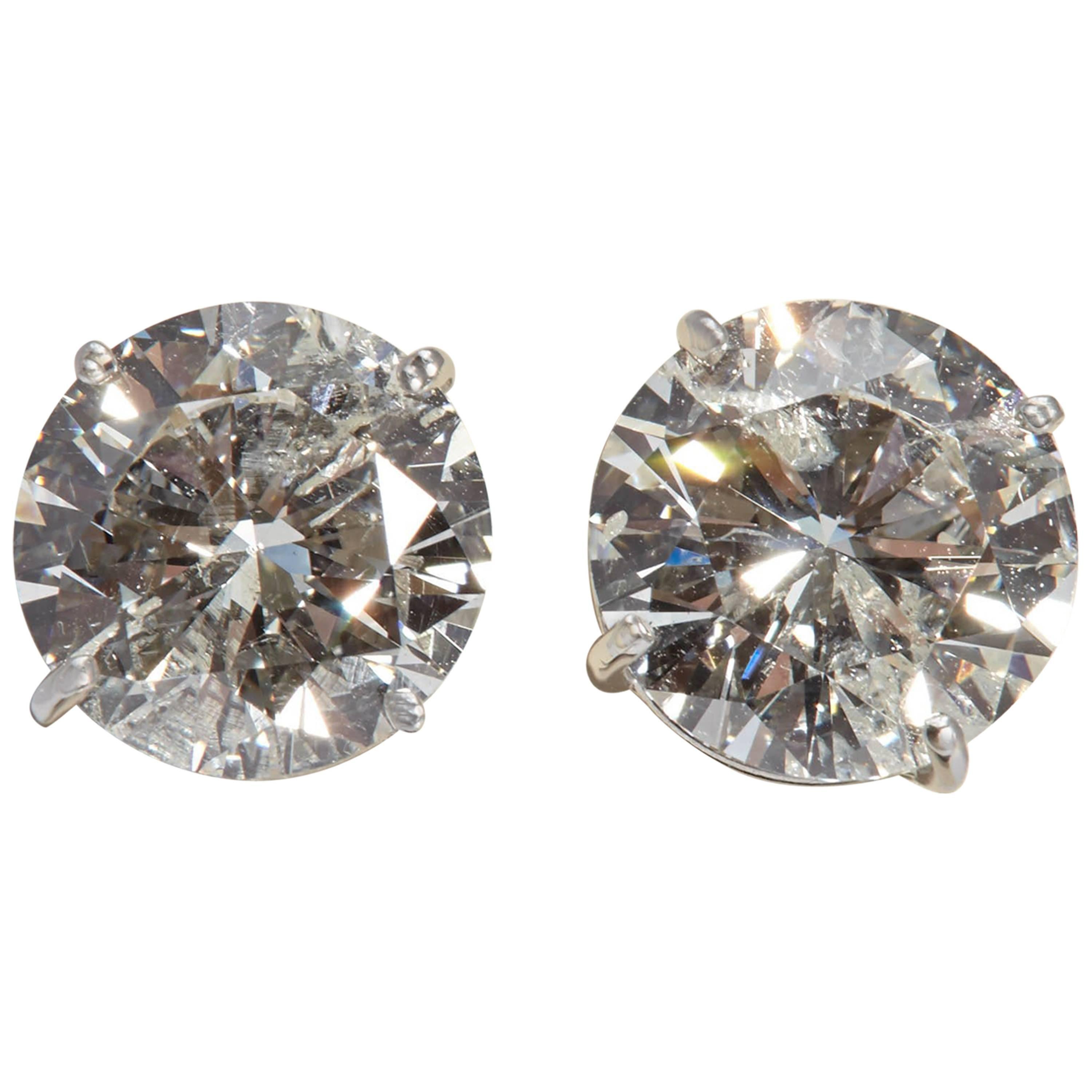 Large Round Diamond Earrings 7.01 Carat For Sale