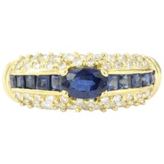 Retro Hammerman Bros 18 Karat Gold Blue Sapphire and Diamond Ring