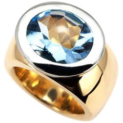 Gold and Platinum Oval Blue Topaz Ring