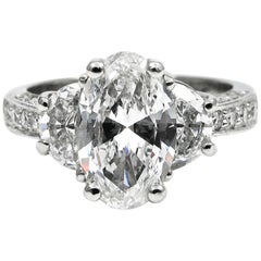 GIA Certified 2.55 Carat Total Oval and Half Moon Pave Diamond Platinum Ring