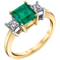 Anillos esmeralda de tres piedras