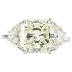6.35 Carat Radiant Diamond in Platinum Mounting with Two Half Moons Ring