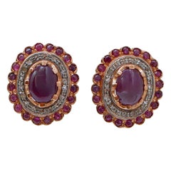 Ohrringe aus Rubin, Diamanten, Roségold und Silber.