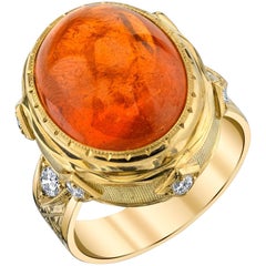 28.55 Karat Spessartit Granat Cabochon und Diamantring aus 18 Karat Gelbgold