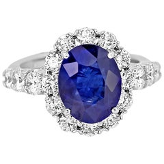 Tanzanite Oval Diamond Halo Gold Bridal Ring 2