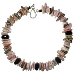 Necklace of Chunky Slices of Pink Peruvian Opal Accented with Black Onyx Rondels